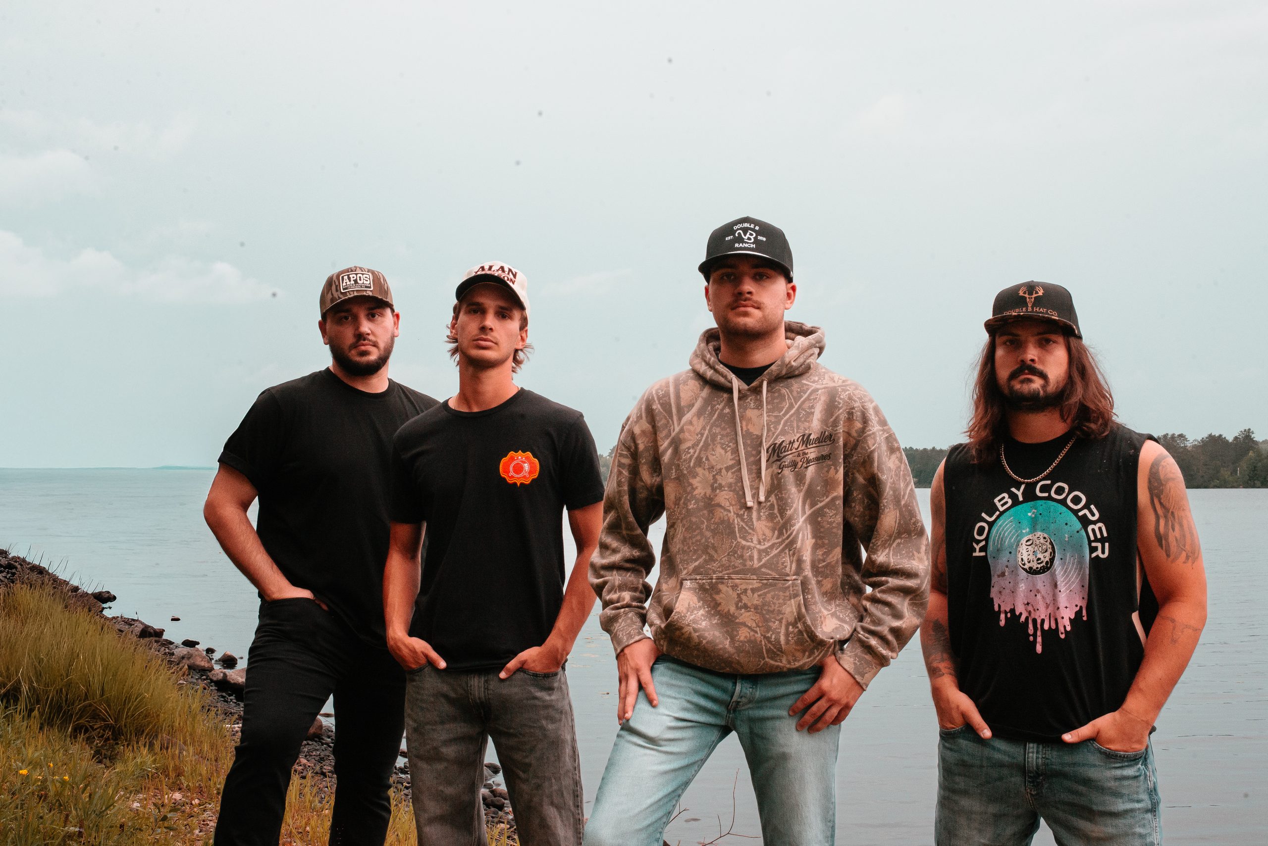 Matt Mueller and the Guilty Pleasures by a lake